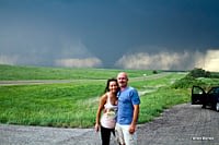 Storm Chasers Brian and Tam Barnes with Tornado